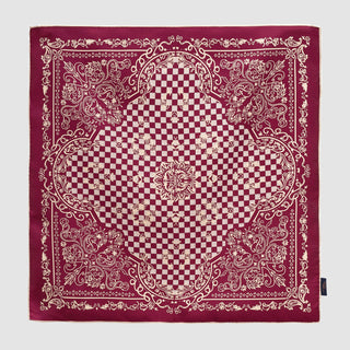 Luxurious burgundy silk bandana with baroque check pattern, featuring ornate cream floral designs and hand-rolled edges in square 53cm format.