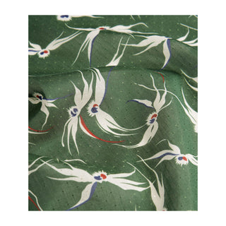 Stylised bird print scarves in green, made from 30% silk and 70% organic cotton.