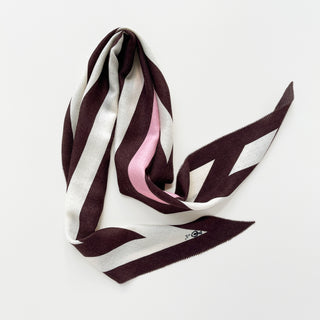 Cashmere wool silk scarf in brown, white and pink with herringbone stripes.