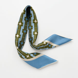 Men's luxury silk square scarf featuring retro geometric pattern in dusty blue & olive green colour way with hand-rolled edges. 