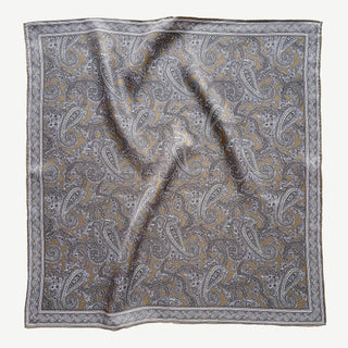 Men's square silk neckerchief in taupe featuring paisley pattern with hand-rolled edges.