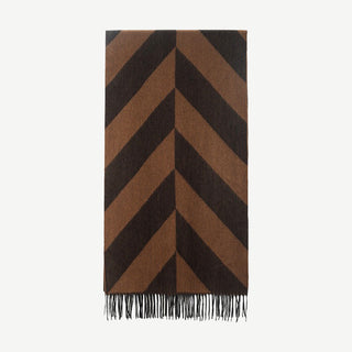 Folded brown and black herringbone cashmere scarf with fringed edges on light grey background.
