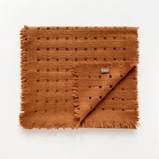 Burnt mustard pure cashmere scarf featuring openwork jacquard design by LuluLane