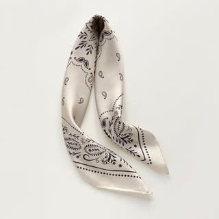 Ivory silk bandana scarf, 65cm square with modern paisley design and hand-rolled hems by LuluLane.