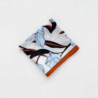 Folded women’s silk bandana scarf 53cm with tulip floral print, double-sided satin square with burnt orange border by LuluLane