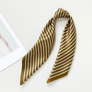 Luxurious silk bandana scarf in antique brown with white diagonal striped pattern, elegantly draped on white background showcasing sheen and texture