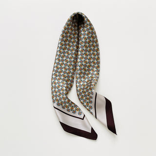 men's silk neckerchief with heritage geometric print in ivory, blue and brown, 65cm square scarf