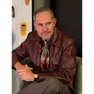Man wearing brown leather jacket and paisley patterned burgundy silk neckerchief scarf – men’s silk scarf by LuluLane.