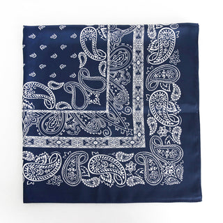 Navy blue silk bandana scarf with traditional white paisley pattern, square shape with decorative border, shown flat against white background