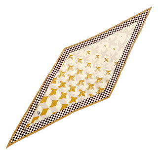 Diamond-shaped beige scarf with Art Deco pattern featuring golden stylized birds, bordered by brown and cream checkerboard design with warm gold trim