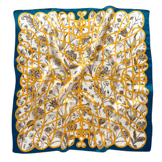 Square silk scarf with ivory center featuring botanical sketches, golden baroque ribbon pattern overlay, and rich teal border framing the elegant design.
