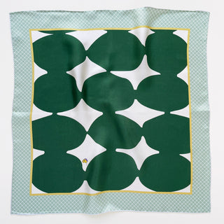 Square silk scarf with retro mosaic pattern featuring deep green geometric shapes on white background with mint green checkered border and yellow trim