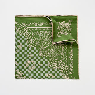 Fresh green silk scarf with baroque pattern and checkered design, featuring hand-rolled edges and cream-colored ornate detailing on luxurious twill fabric