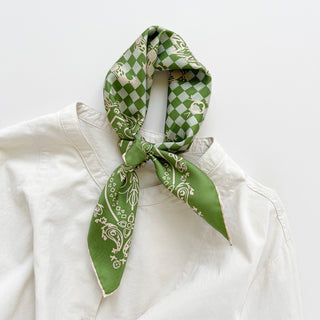 Luxurious Fresh Green silk bandana with baroque check pattern and white decorative motifs, elegantly tied around a white shirt collar