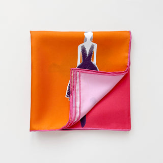 Pink Lady silk scarf featuring a fashion illustration of a figure in purple dress against vibrant orange and pink background with hand-rolled edges