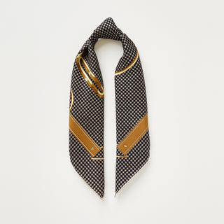 Luxury 65cm silk square scarf with black and beige houndstooth pattern, gold border accents, and hand-rolled edges displayed on white background