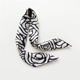women's silk square scarf with charcoal black abstract rose pattern on cream white base with hand-rolled edges