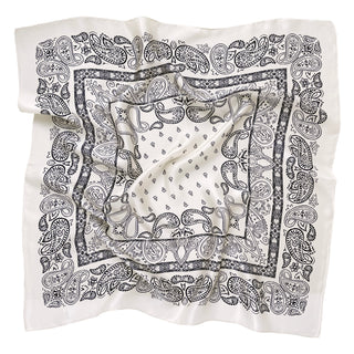 Light beige silk bandana scarf with intricate black paisley pattern, featuring decorative borders and a central design on luxurious shimmering fabric.