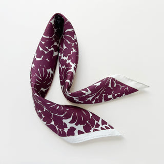Luxury silk scarf in burgundy floral print with ice white border.