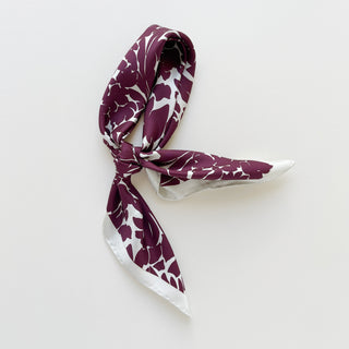 Luxury silk scarf in burgundy floral print with ice white border.