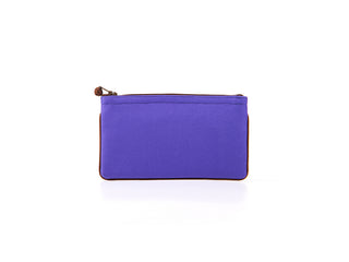 Handmade recycled zipper wallet in bright purple with decorative button, featuring clean piping edges and YKK zip for cards, coins, and small essentials