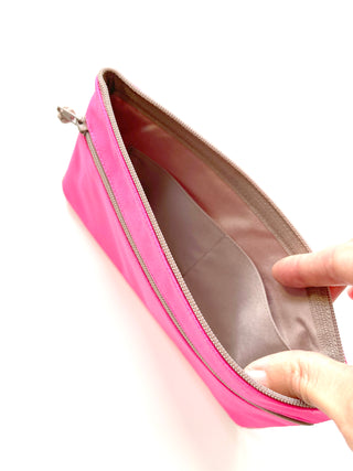 Bright neon pink recycled double zipper wallet with beige trim and interior compartment shown open, displaying the gray lining and storage space