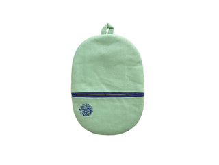 Mint green linen oven mitt with navy blue piping trim, small embroidered design, and hanging loop at top, showcasing handmade quilted texture