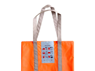 Bright orange recycled large tote bag with beige handles and a blue center patch showing various product icons. Lightweight, eco-friendly shopping bag.